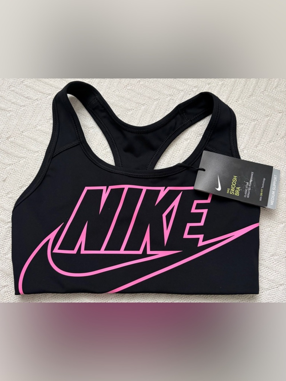 Nike Women’s Black Sports Bra with Pink Accent Swoosh